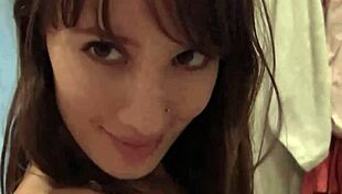 A slutty, dark-haired chick offers to ride your cock and strip her body, she films herself having fun